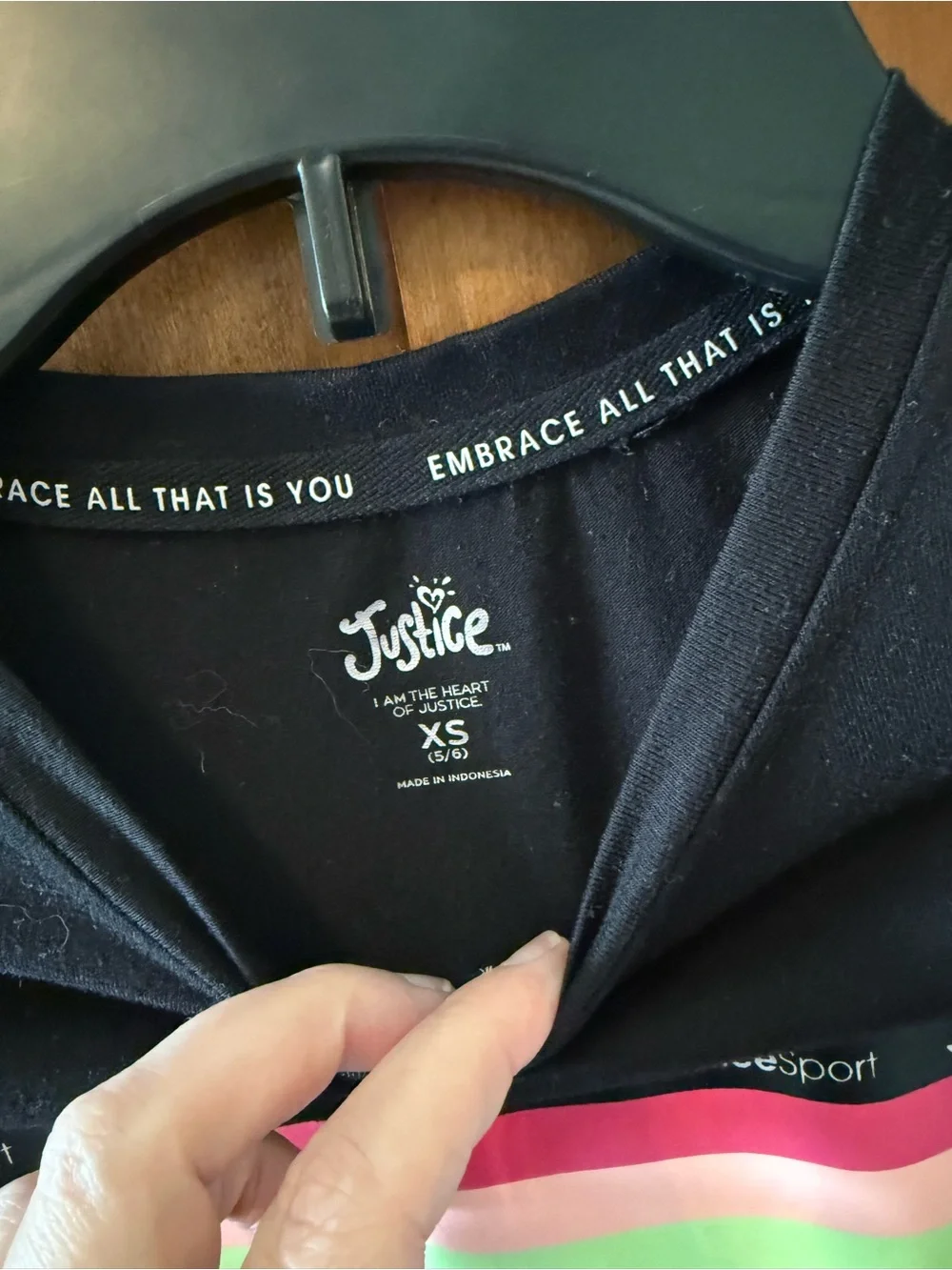 Justice black tee with rainbow stripe